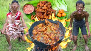 Cooking chicken wing, eating in jungle | Primitive technology
